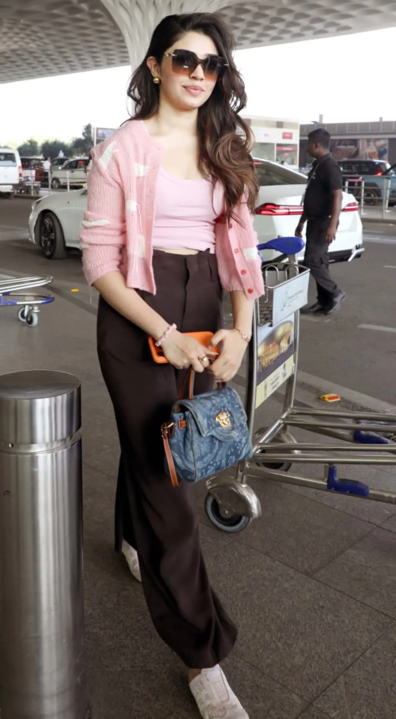 <p>Actress Krithi Shetty was spotted at the airport on Wednesday morning, dressed in a pink top with a matching jacket and black trousers.</p>